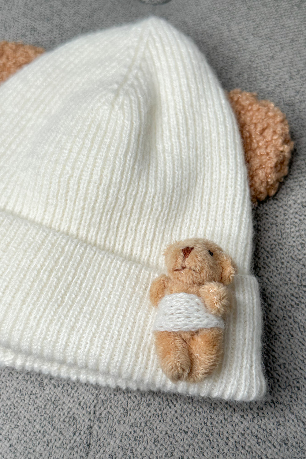 Jamiks Ivory Ribbed Bear Beanie Hat | Millie and John