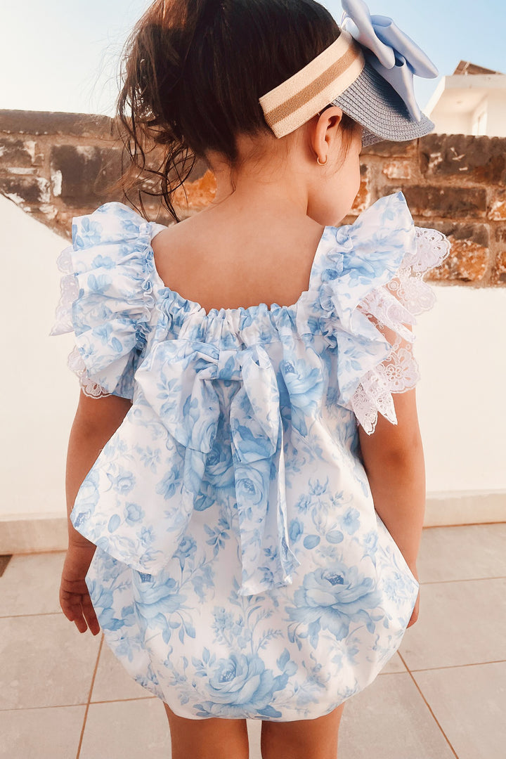 Fofettes x Be Chic "Elara" Blue Floral Lace Bow Romper | Millie and John