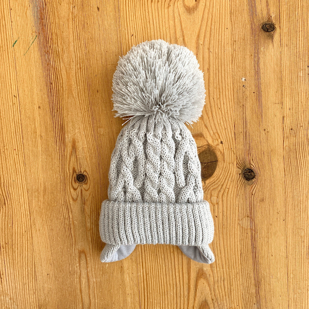 Little Nosh Cable Knit Pom Pom Hat with Ear Flaps | Millie and John